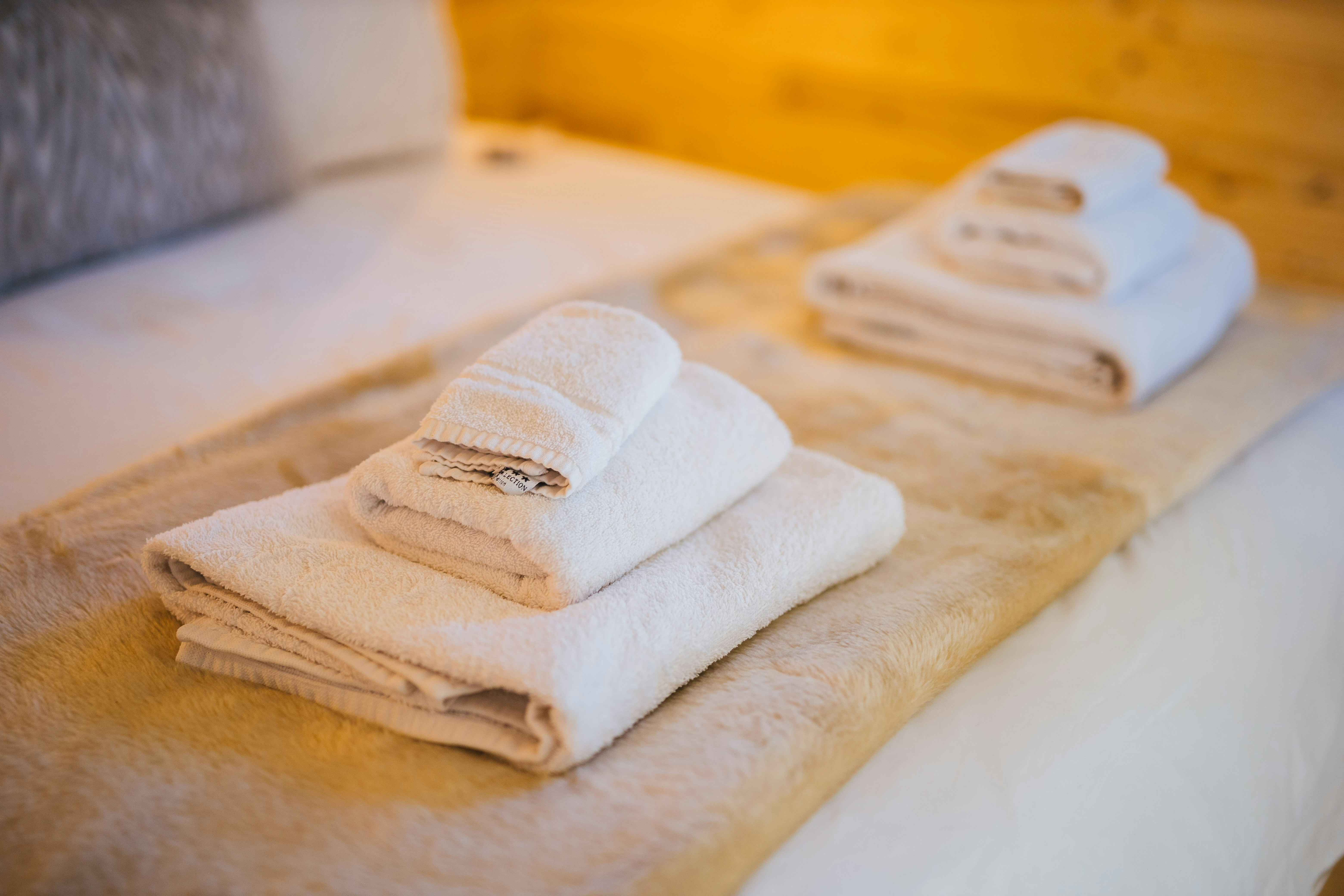 Freshly folded towels for a vacation rental turnover